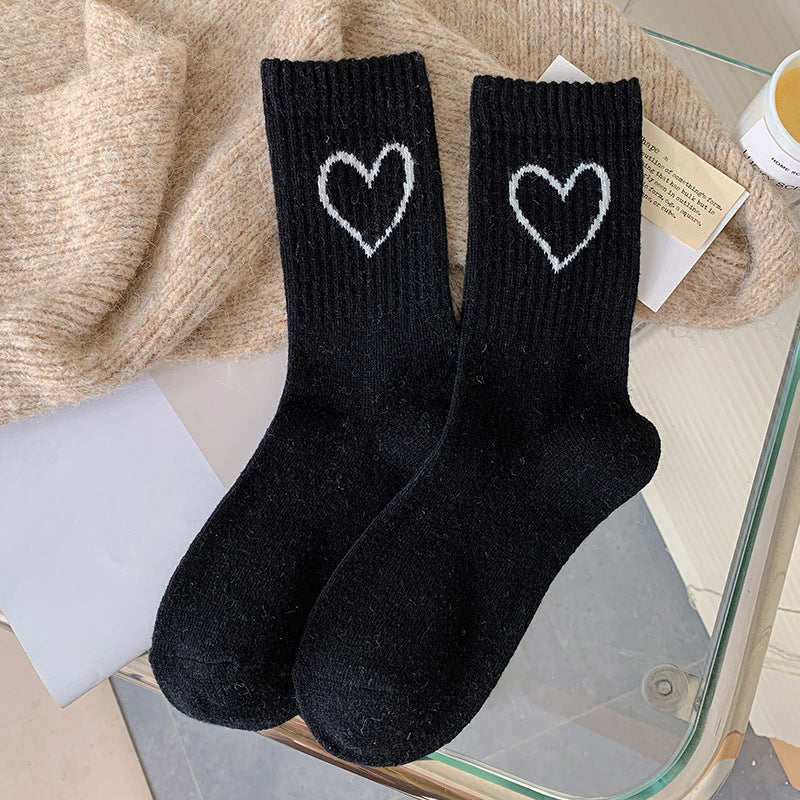 Chaussettes en laine chaussettes d'amour femmes rétro couleur café épaissies chaussettes tube moyen chaud ins marée mode automne et hiver bas en gros