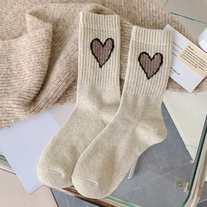 Chaussettes en laine chaussettes d'amour femmes rétro couleur café épaissies chaussettes tube moyen chaud ins marée mode automne et hiver bas en gros