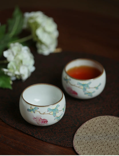 Tasse à thé en céramique Gohobi peinte à la main en forme de poisson rouge et d'osmanthus