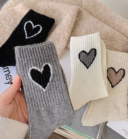 Chaussettes en laine chaussettes d'amour femmes rétro couleur café épaissies chaussettes tube moyen chaud ins marée mode automne et hiver bas en gros